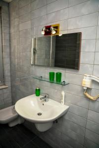 Koupelna v ubytování Hotel Pernoca