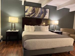 Postelja oz. postelje v sobi nastanitve Quality Inn & Suites