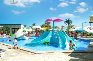 an image of a water park with a slide at Lamera - Alezzi Apartament langa mare cu acces la piscina, jacuzzi, sauna si sala de fitness in Năvodari