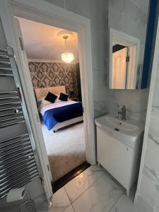 Postelja oz. postelje v sobi nastanitve Bray Head B&B