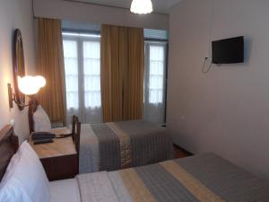 Giường trong phòng chung tại Hotel S. Marino