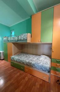 a room with two bunk beds in a room at La Foggia seaside paradise in Siculiana