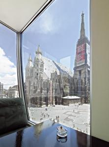 a view of a city from a window at DO&CO Hotel Vienna in Vienna