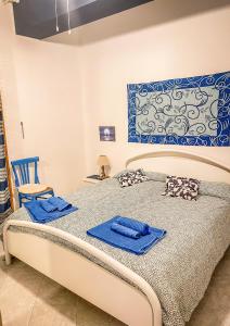 Postel nebo postele na pokoji v ubytování Solemare Letojanni apartment