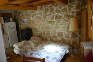 Posteľ alebo postele v izbe v ubytovaní Studio Apartment La Maison de Catherine