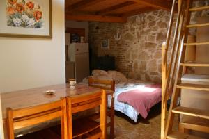 Posteľ alebo postele v izbe v ubytovaní Studio Apartment La Maison de Catherine