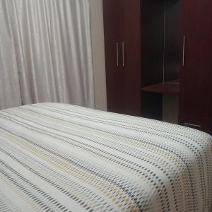 Krevet ili kreveti u jedinici u okviru objekta Fortunate Travelaccommodation