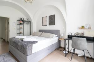 Katil atau katil-katil dalam bilik di Wachau Ruhepol / 45m² / Idyllisch mit Gartenterrasse