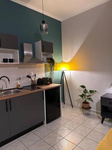 a kitchen with a sink and a counter top at Jo's Studios in Myrina