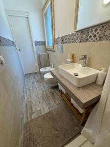 Kúpeľňa v ubytovaní Attico Mare Taormina with parking