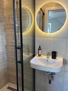 Kúpeľňa v ubytovaní Karwia Pokoje & Apartamenty