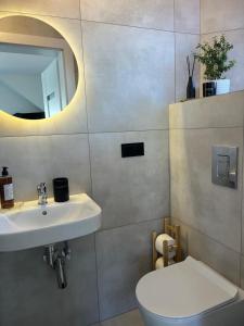 Kúpeľňa v ubytovaní Karwia Pokoje & Apartamenty