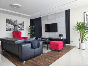 Μια τηλεόραση ή/και κέντρο ψυχαγωγίας στο YOUR Apartment Unia Art Residence