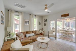 a living room with a couch and a table at Summer Village Family Cottage with Community Perks! in Westford