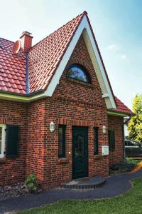 DassowにあるFerienhaus Sandregenpfeiferのレンガ造りの家