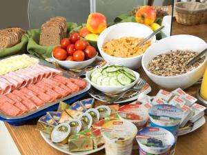 a table topped with lots of different types of food at Gästehaus Ferk - Frühstückspension, Bed & Breakfast in Bad Radkersburg