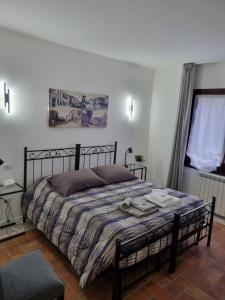 a bedroom with a bed in a room at Villa Trevisi - APARTMENT in Treviso
