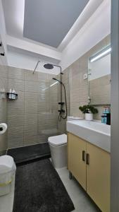 Koupelna v ubytování Papagayo Beach Apartments