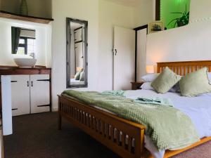 Postel nebo postele na pokoji v ubytování Countryside cottage near Crediton