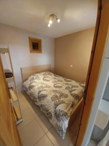 Postel nebo postele na pokoji v ubytování Appartement cosy à Les Belleville 48 m² avec terrasse privée