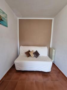 Tempat tidur dalam kamar di Ca' della Bardona