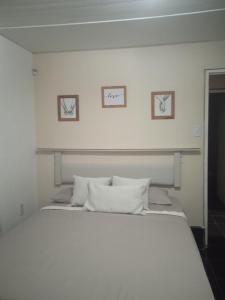 Ένα ή περισσότερα κρεβάτια σε δωμάτιο στο GM Apartamento Turístico