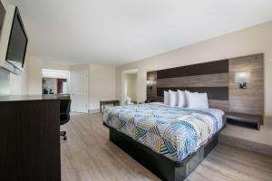 Ένα ή περισσότερα κρεβάτια σε δωμάτιο στο Motel 6 Macon, GA I 475 +22 φωτογραφίες