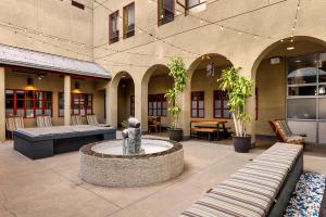 a courtyard with a fountain in front of a building at HI Los Angeles - Santa Monica Hostel in Los Angeles