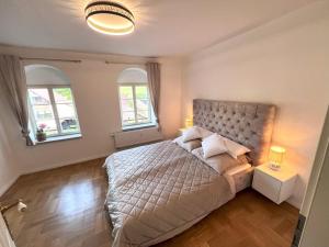 Postel nebo postele na pokoji v ubytování Schloss in der sächsischen Schweiz - Luxus Apartments