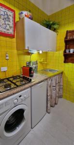 A kitchen or kitchenette at Casa Albergheria Még 15 kép