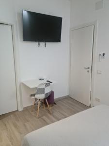 A television and/or entertainment centre at Ruggero Settimo Gallery