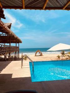 Bazén v ubytování Hotel Mulata nebo v jeho okolí