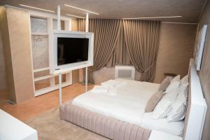 Postel nebo postele na pokoji v ubytování Hotel Pernoca