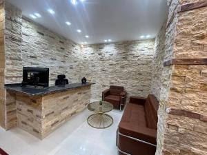A television and/or entertainment centre at Dima Pyramids View