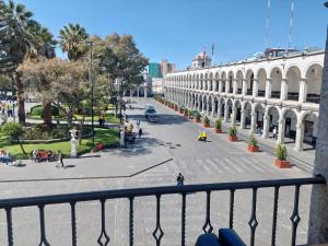 a view of a street from a balcony of a building at Maison plaza in Arequipa