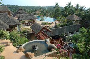 an aerial view of a resort with a swimming pool at Taj Green Cove Resort and Spa Kovalam in Kovalam