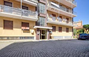 a building with a car parked in front of it at Gorgeous Apartment In Sestri Levante in Sestri Levante