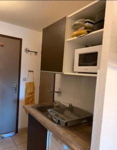 Kuchyň nebo kuchyňský kout v ubytování super cosy Métabief pied piste + 2 fotografie