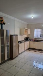 Η κουζίνα ή μικρή κουζίνα στο Hospedagem Vermont