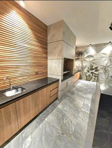 a kitchen with a sink and a counter top at Santa Cruz de La Sierra - 3 Pago con Qr bedroom luxury apartment in Santa Cruz de la Sierra