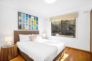 Aireys Inlet Getaway客房内的一张或多张床位