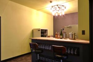 Afbeelding uit fotogalerij van 料理旅館ゆり野 in Wajiki