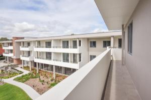 een extern uitzicht op een appartementencomplex bij Brisbane International Virginia in Brisbane