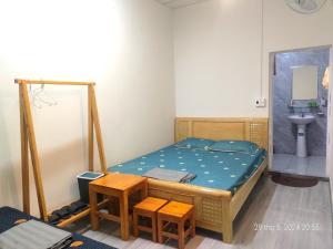 Giường trong phòng chung tại Yến Linh - Hostel & Motorbikes Rental