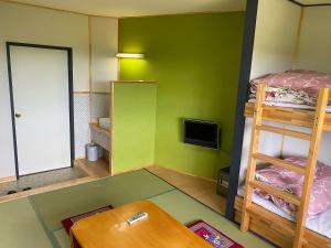 Postel nebo postele na pokoji v ubytování Madarao Lainstons + 37 fotografií
