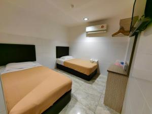 TV a/nebo společenská místnost v ubytování Comfort Two Hotel