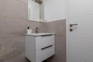 Koupelna v ubytování Sita Apartmani