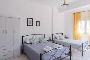 Кровать или кровати в номере Muses_Calliope, Chios