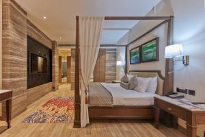 Postel nebo postele na pokoji v ubytování Residency Hotel Fort