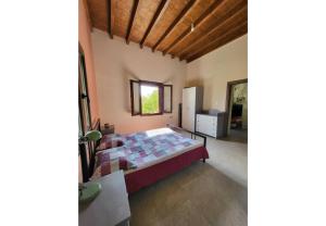 Ένα ή περισσότερα κρεβάτια σε δωμάτιο στο Villa Two Pine Trees